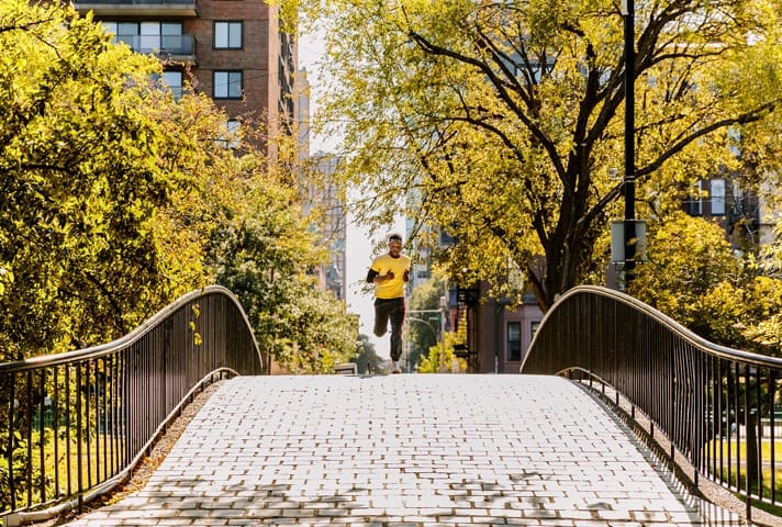 student running in the park
