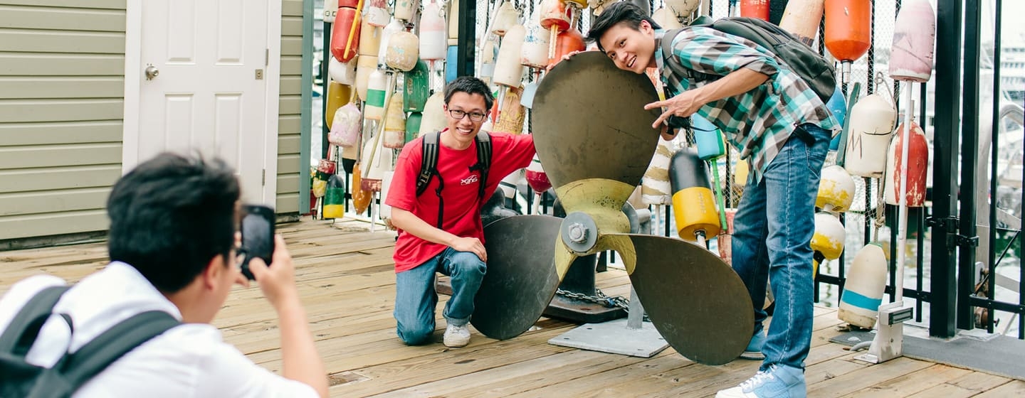 students getting clicked at Boston harborwalk